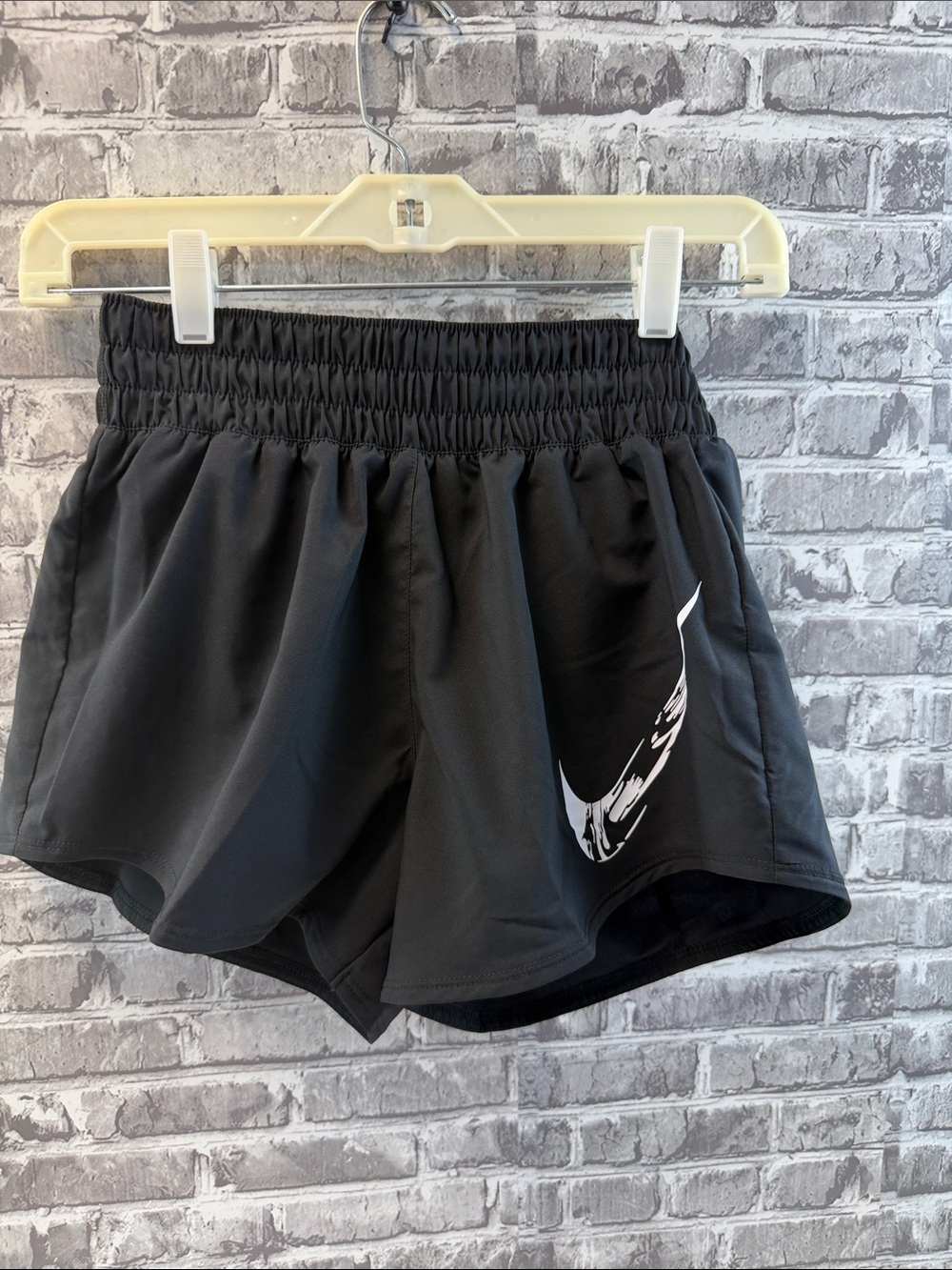 Black Women's Athletic Shorts with White Swoosh‎